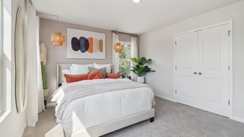 Spacious Bedroom 3 on the main floor with full bath