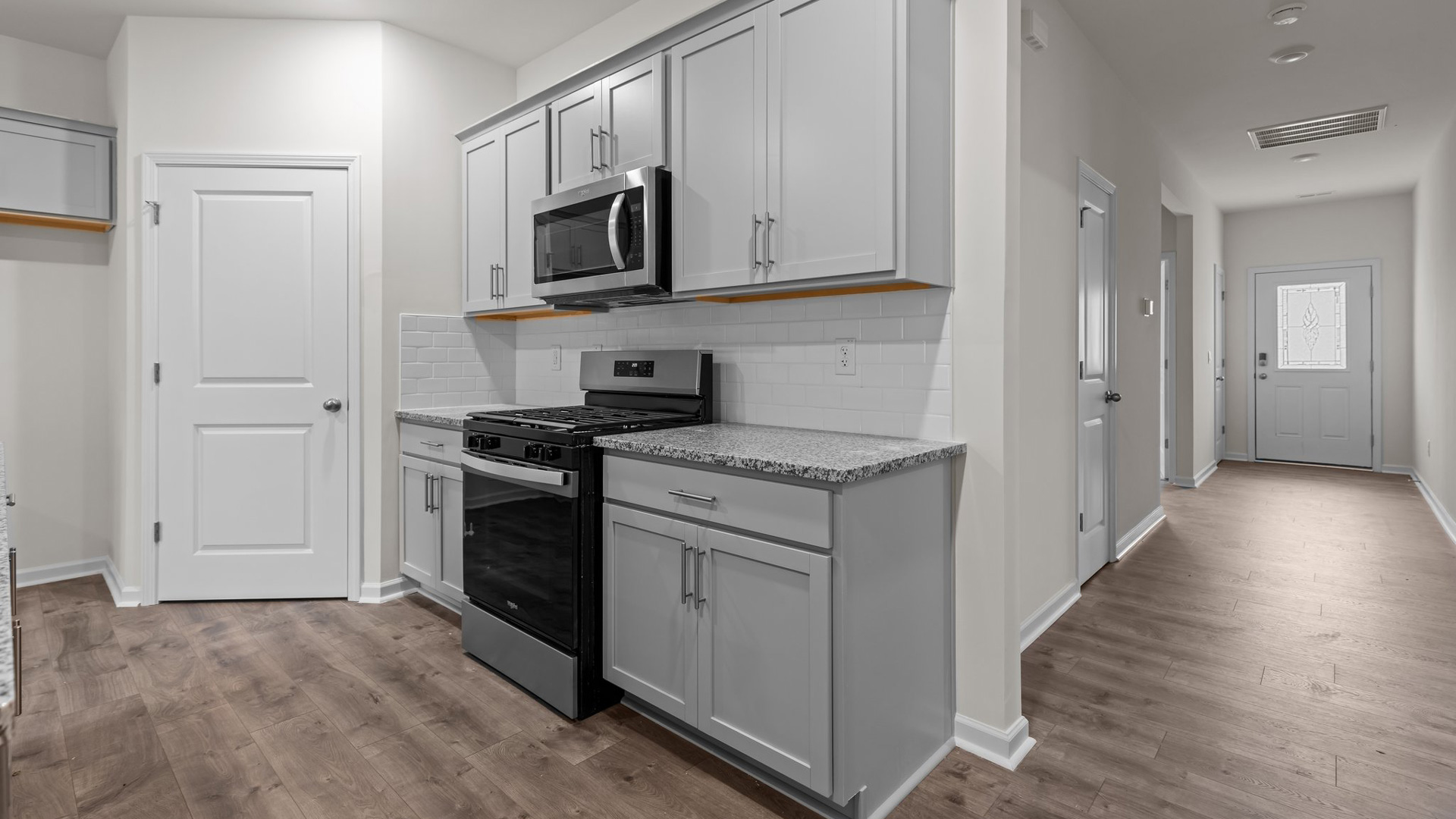 Kitchen with stainless-steel appliances