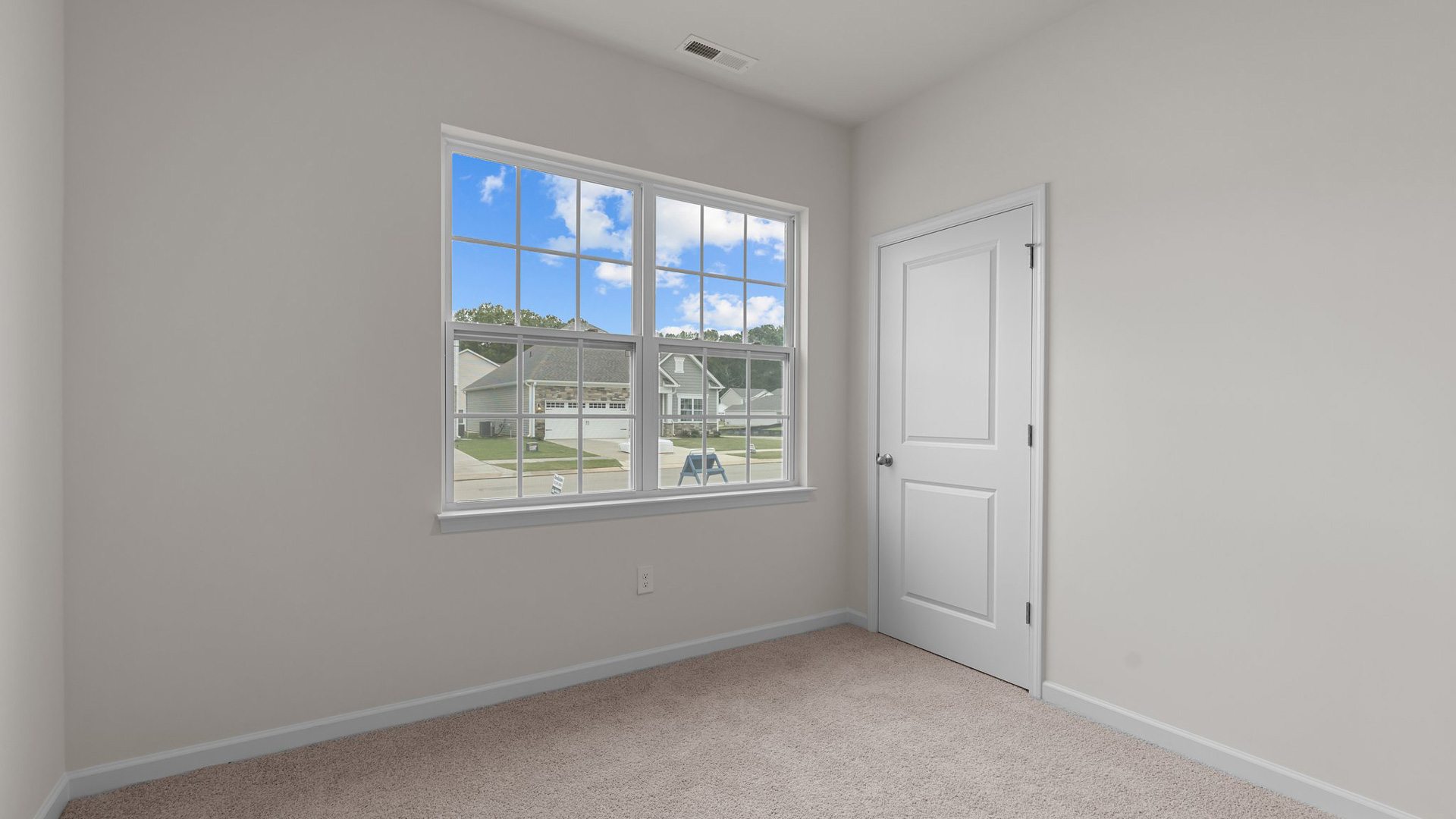 Bedroom with carpet flooring