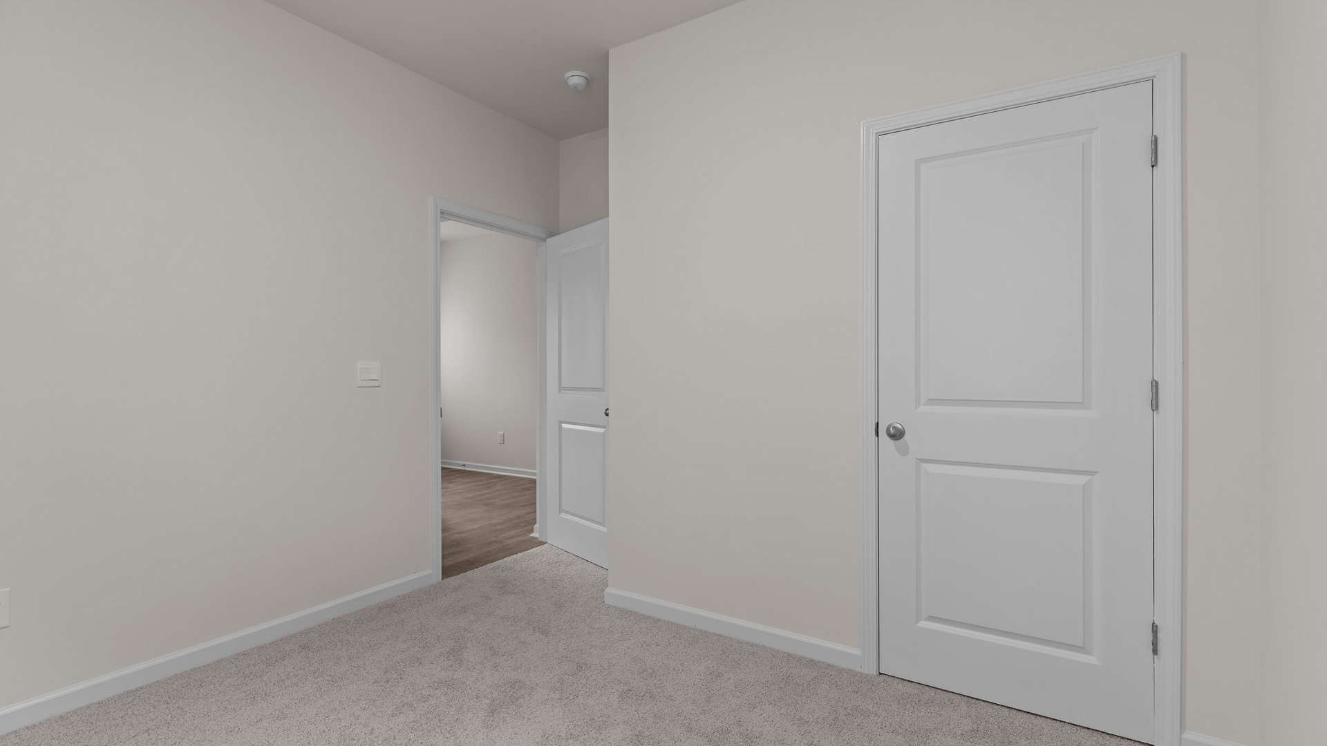 Bedroom with carpet flooring