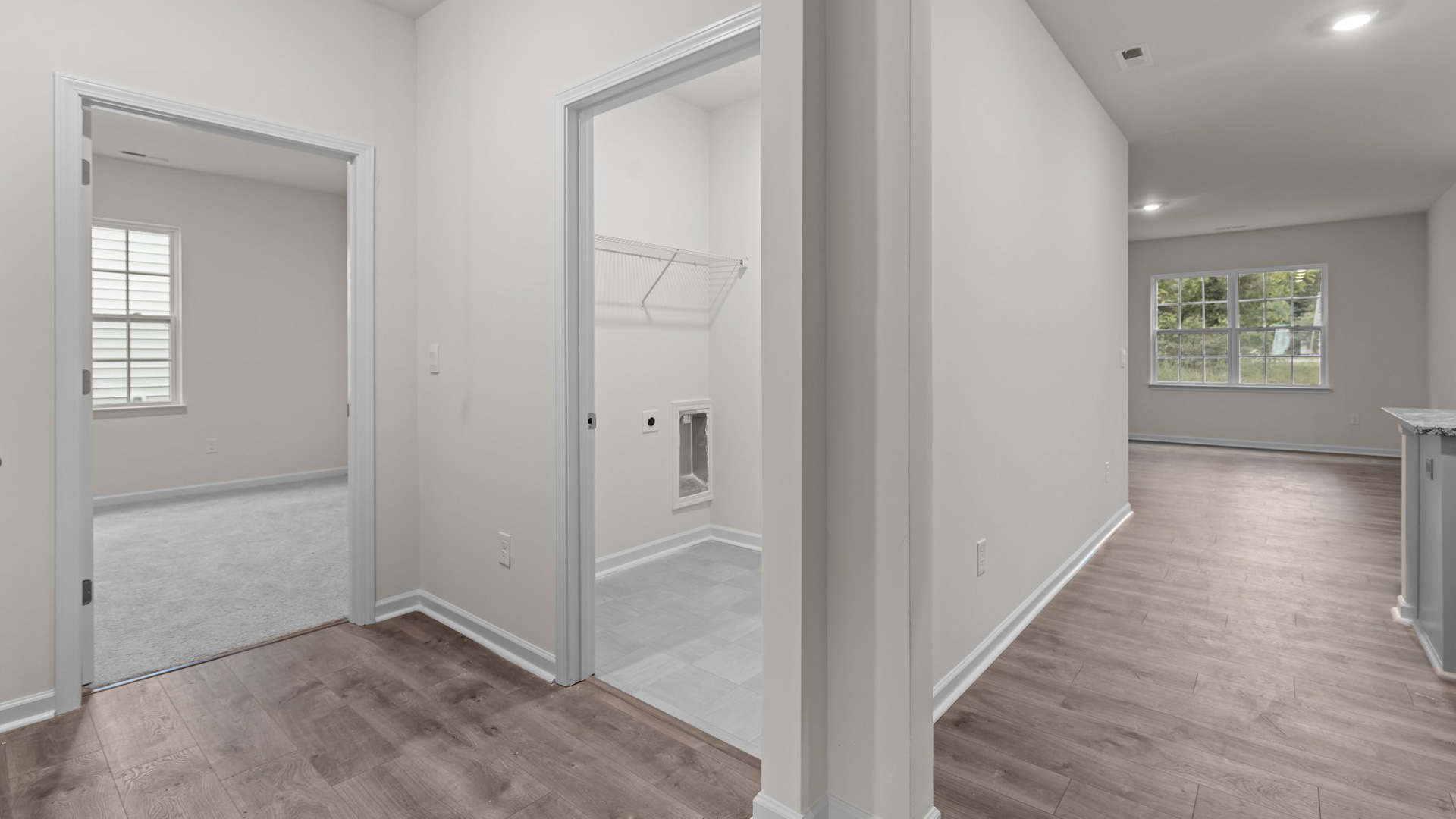 Hallway with revwood flooring