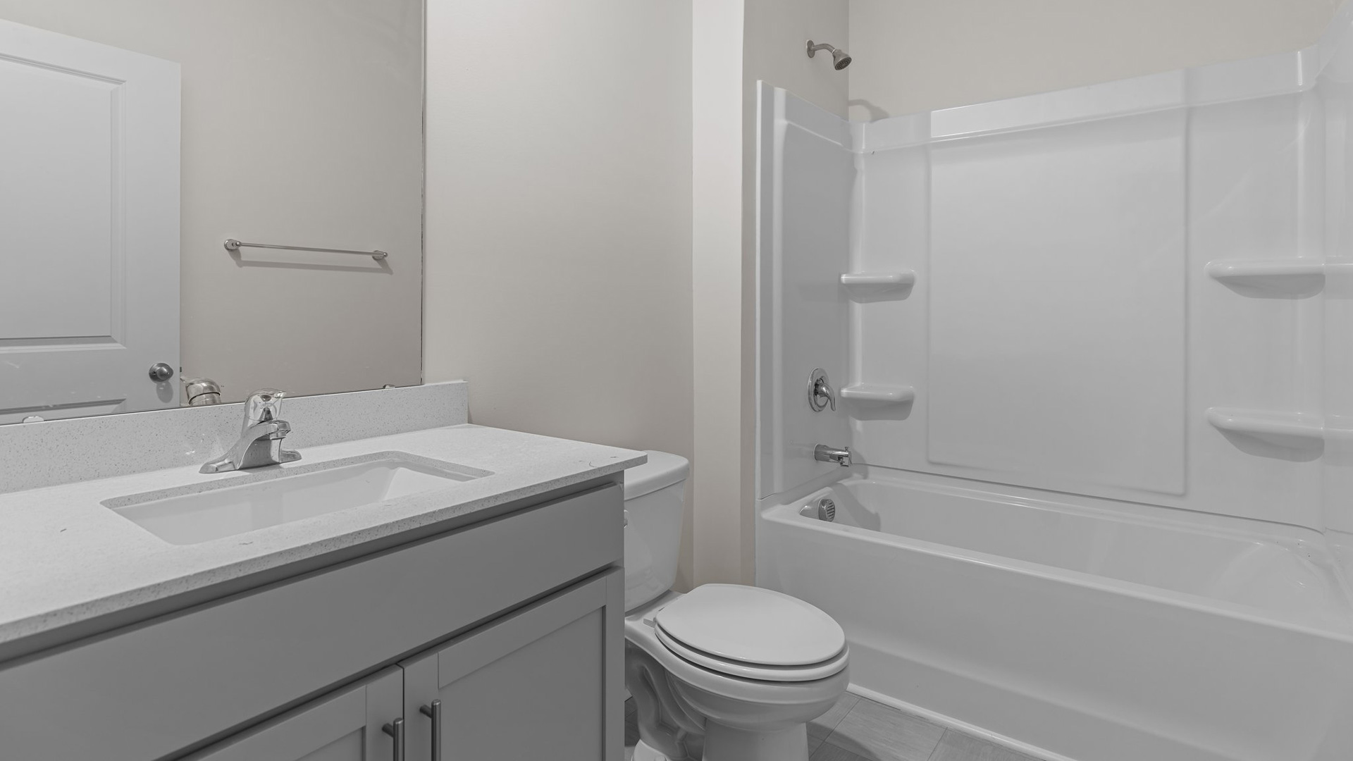 bathroom with quartz counters