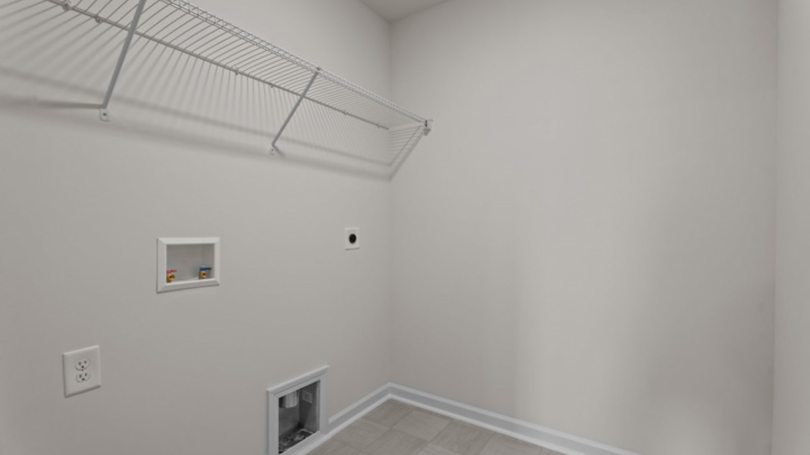 laundry room with ample storage