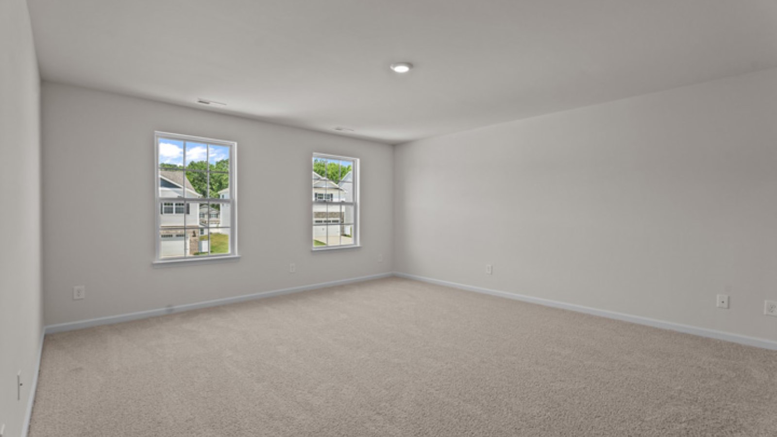 bedroom with windows view