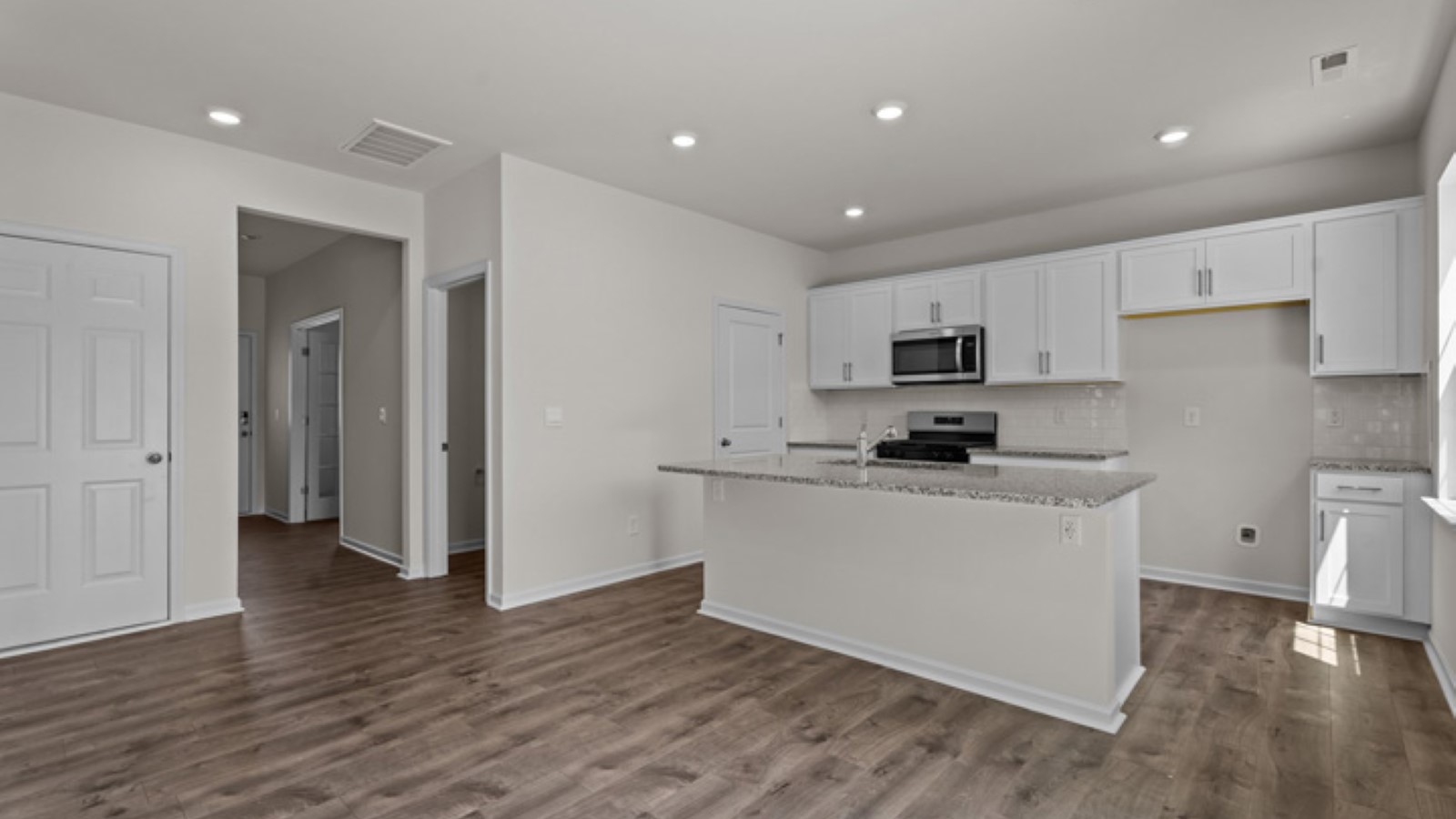 open floorplan with dining and kitchen area