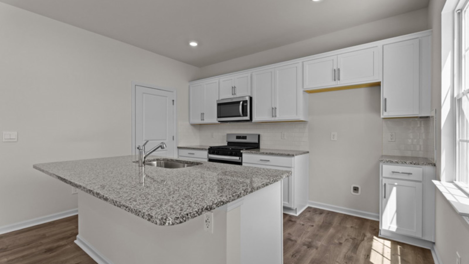 kitchen area with kitchen island