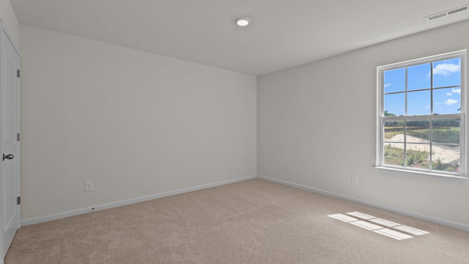 Bedroom with carpet