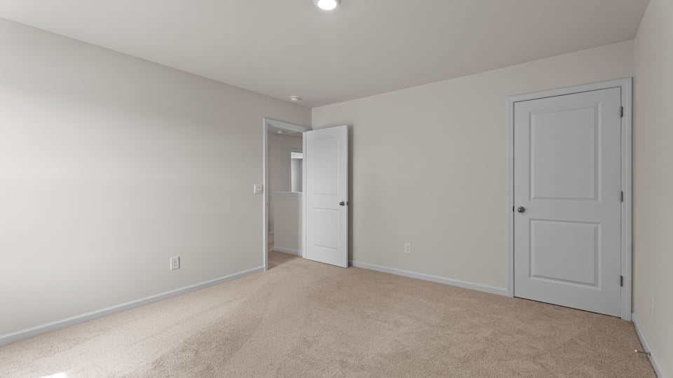 Bedroom with carpet