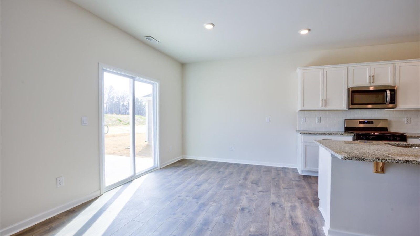Dining area with revwood flooring