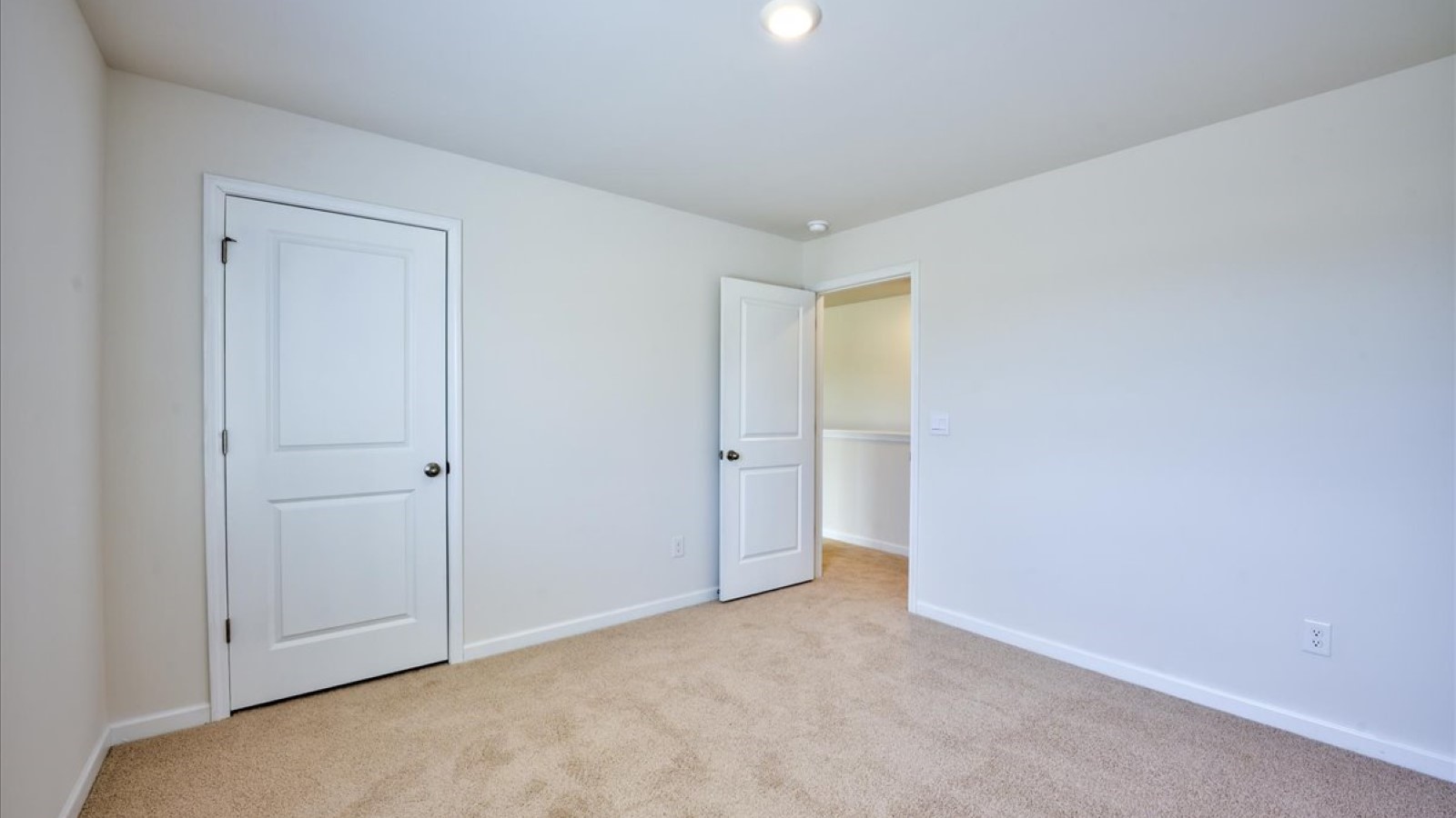 Bedroom with carpet flooring