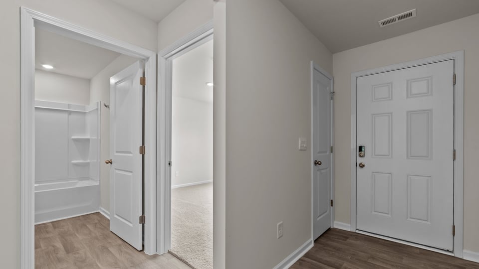 entry way and view of front bedrooms