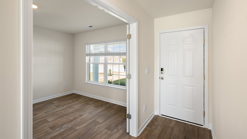 entryway with white door