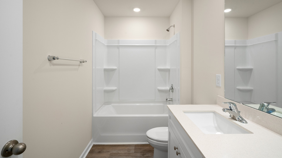 bathroom with quartz counters