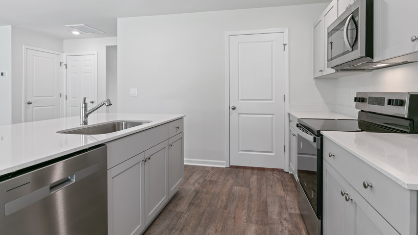 Kitchen with white cabinets
