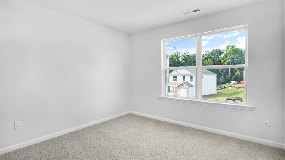 Bedroom with carpet