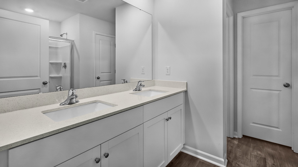 Bathroom with white cabinets