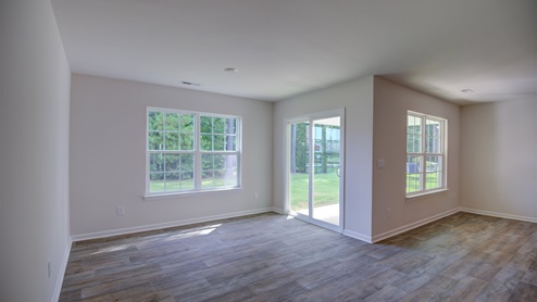 large dining room with sliding back door
