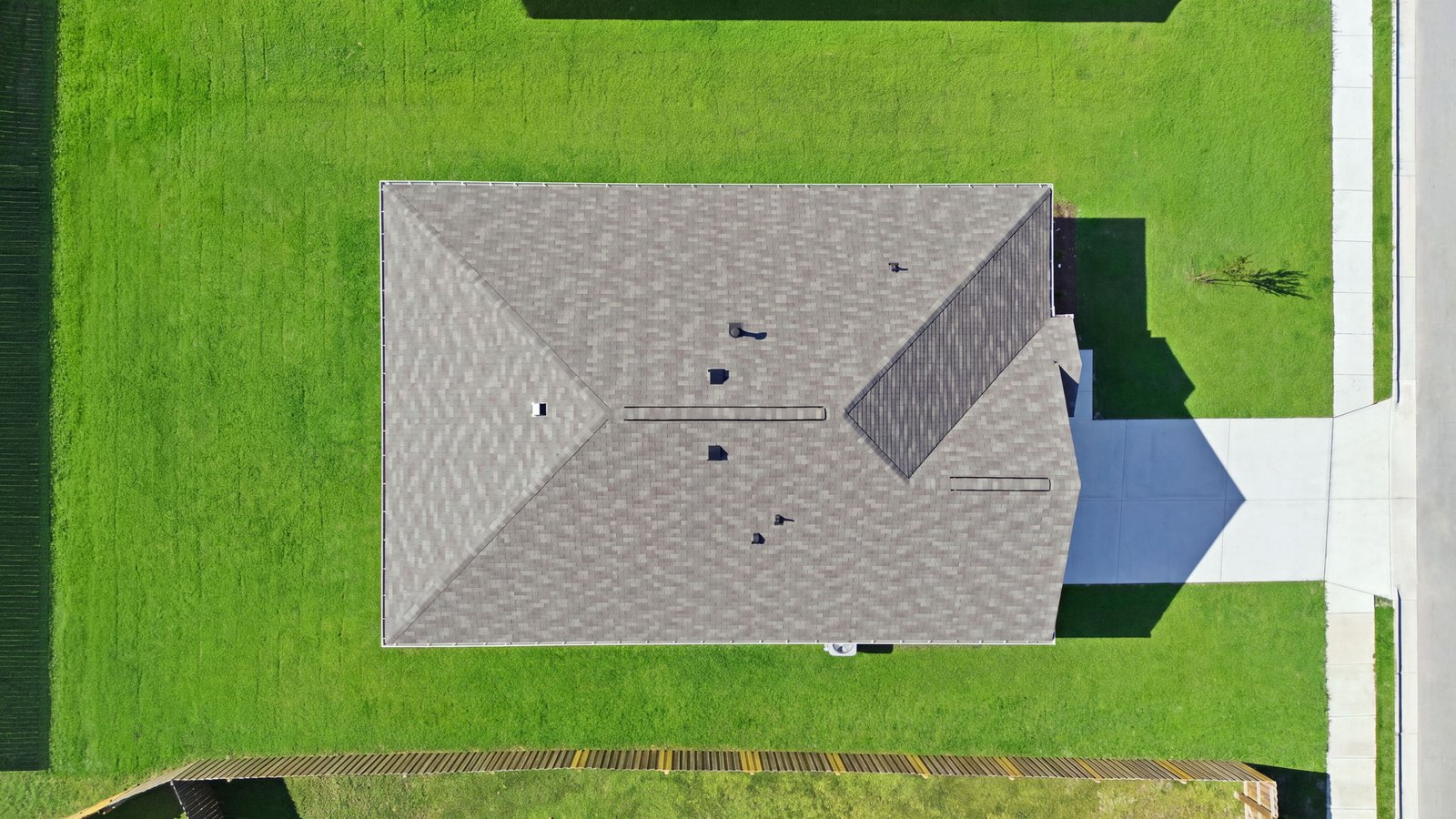 aerial view of home and lot