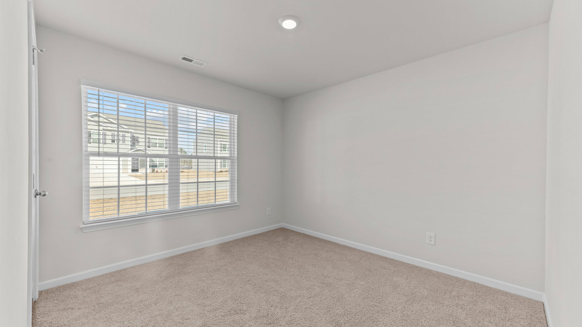 Bedroom with carpet flooring