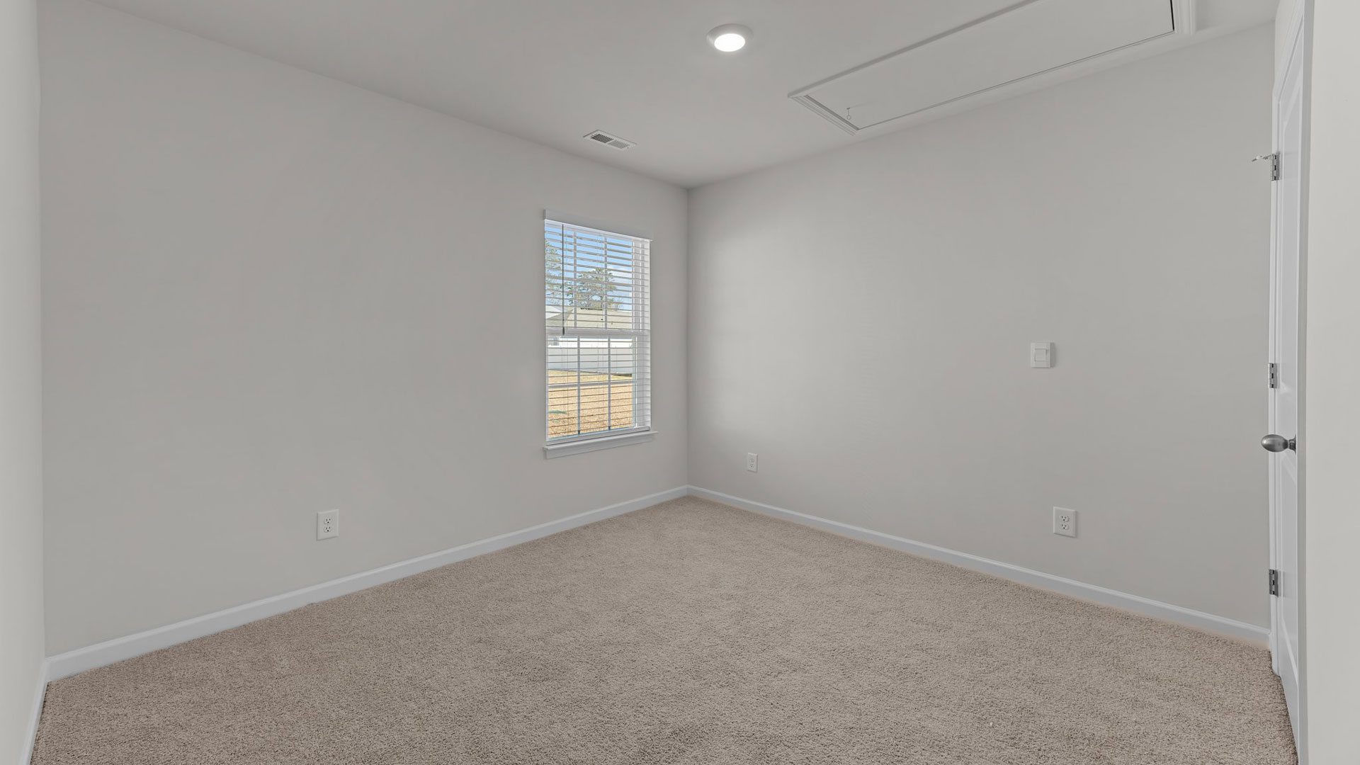 Bedroom with carpet flooring