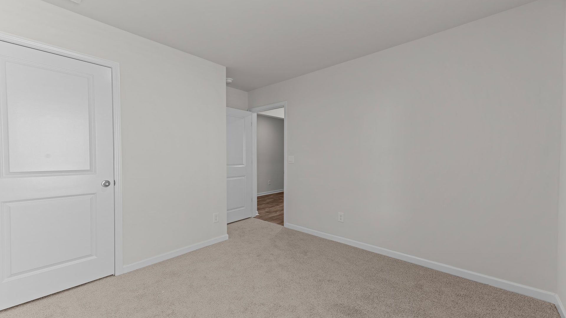 Bedroom with carpet flooring