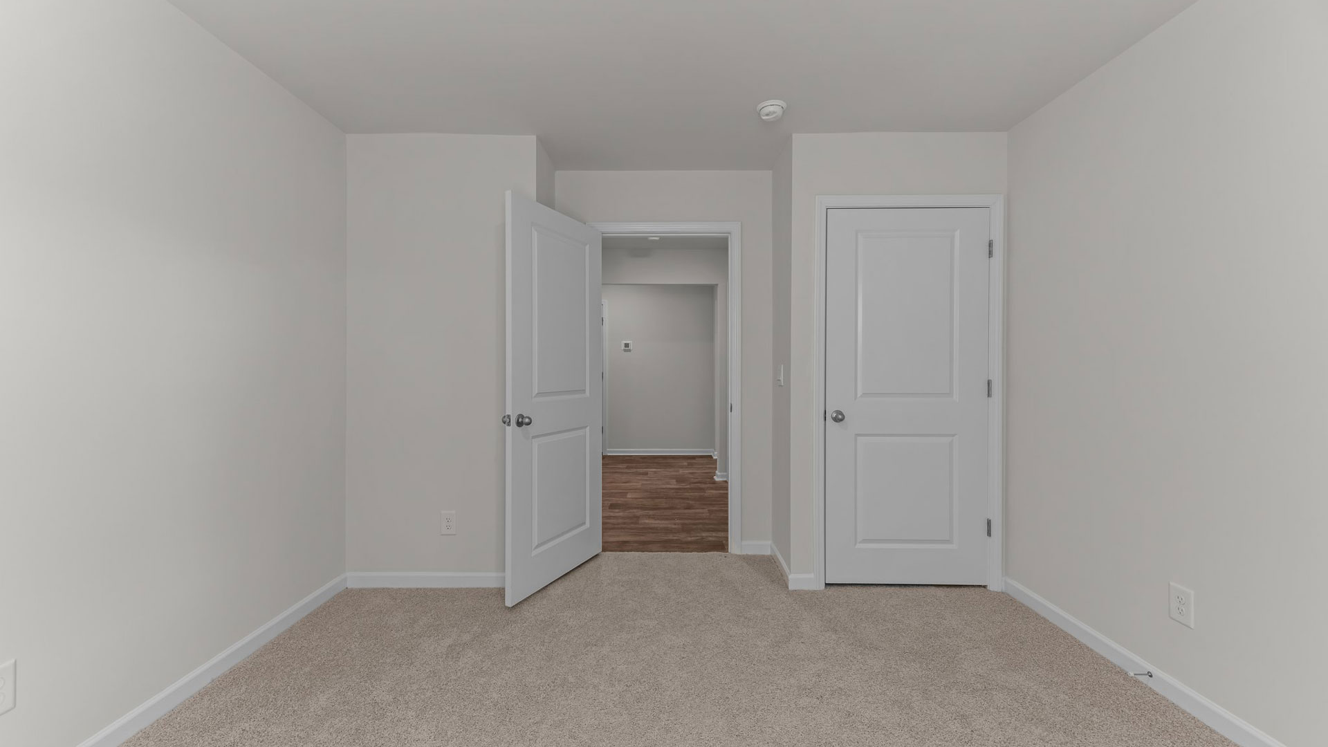 Bedroom with carpet flooring