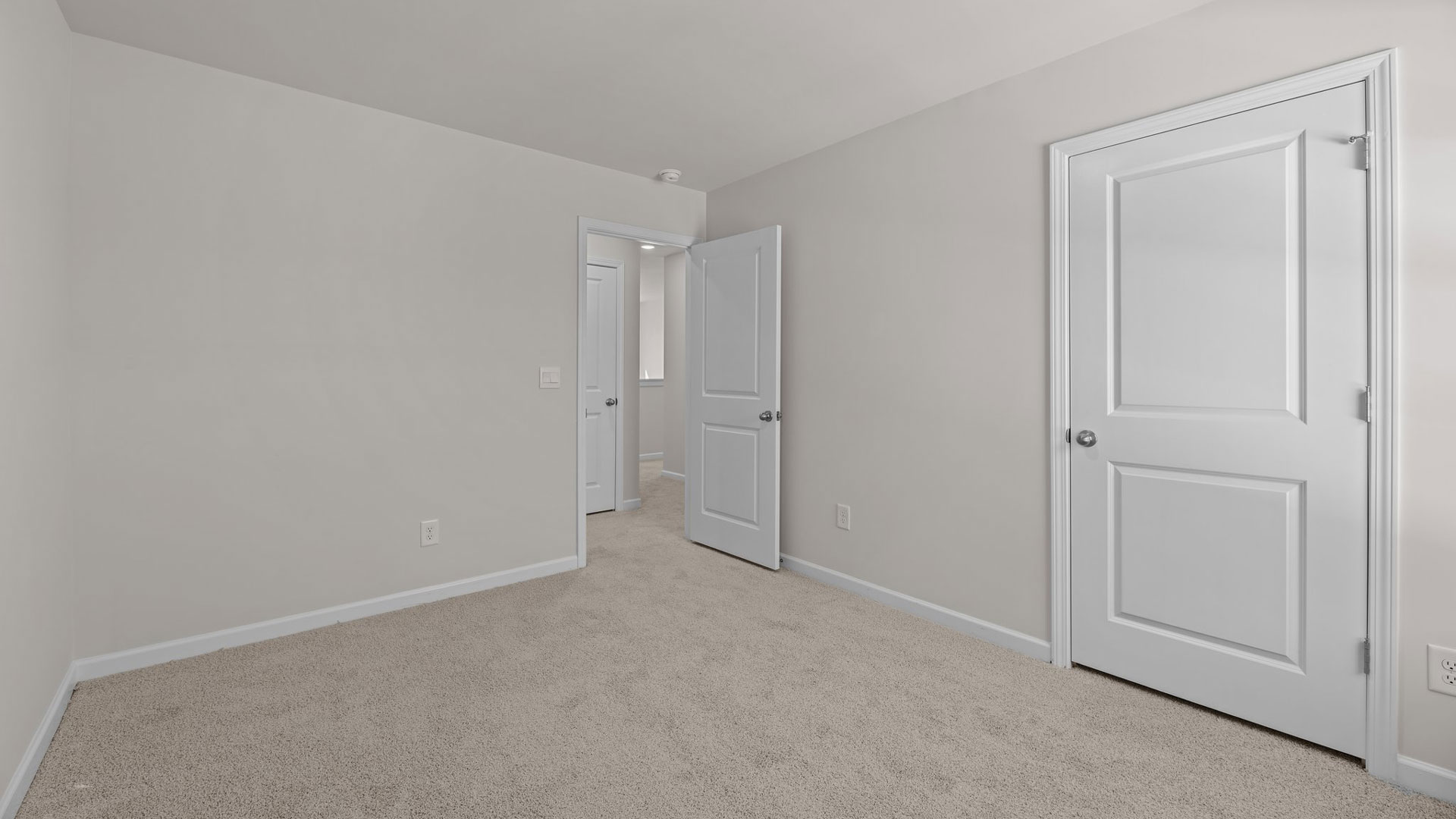Bedroom with carpet flooring