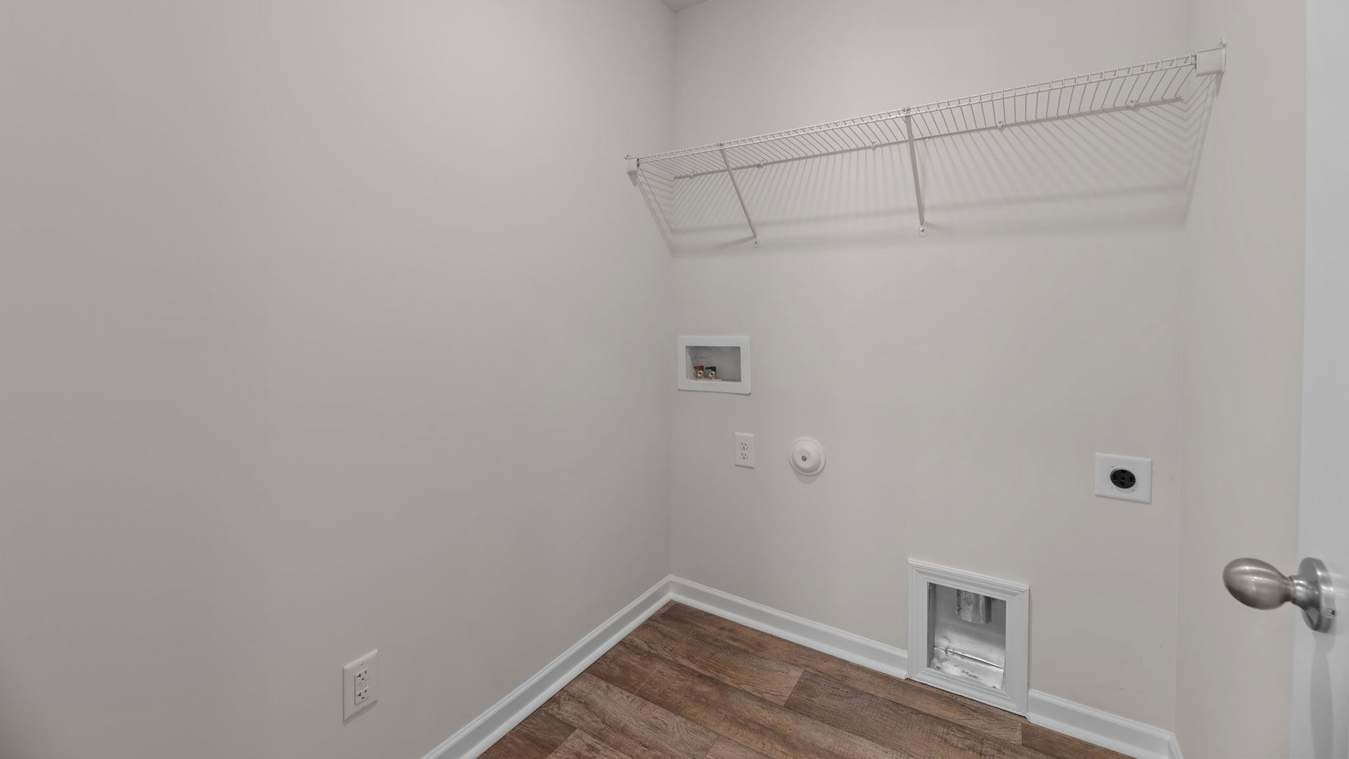 Laundry room with wire shelving