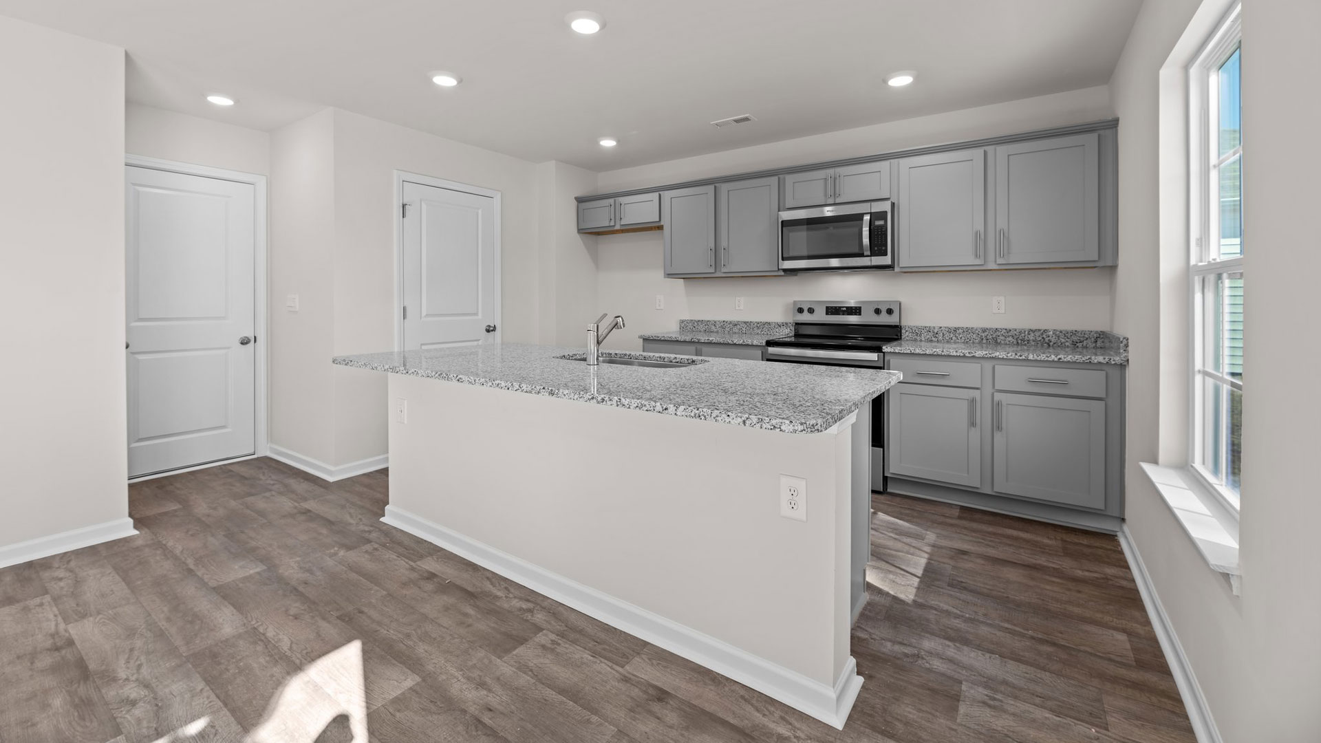 Kitchen with stainless-steel appliances