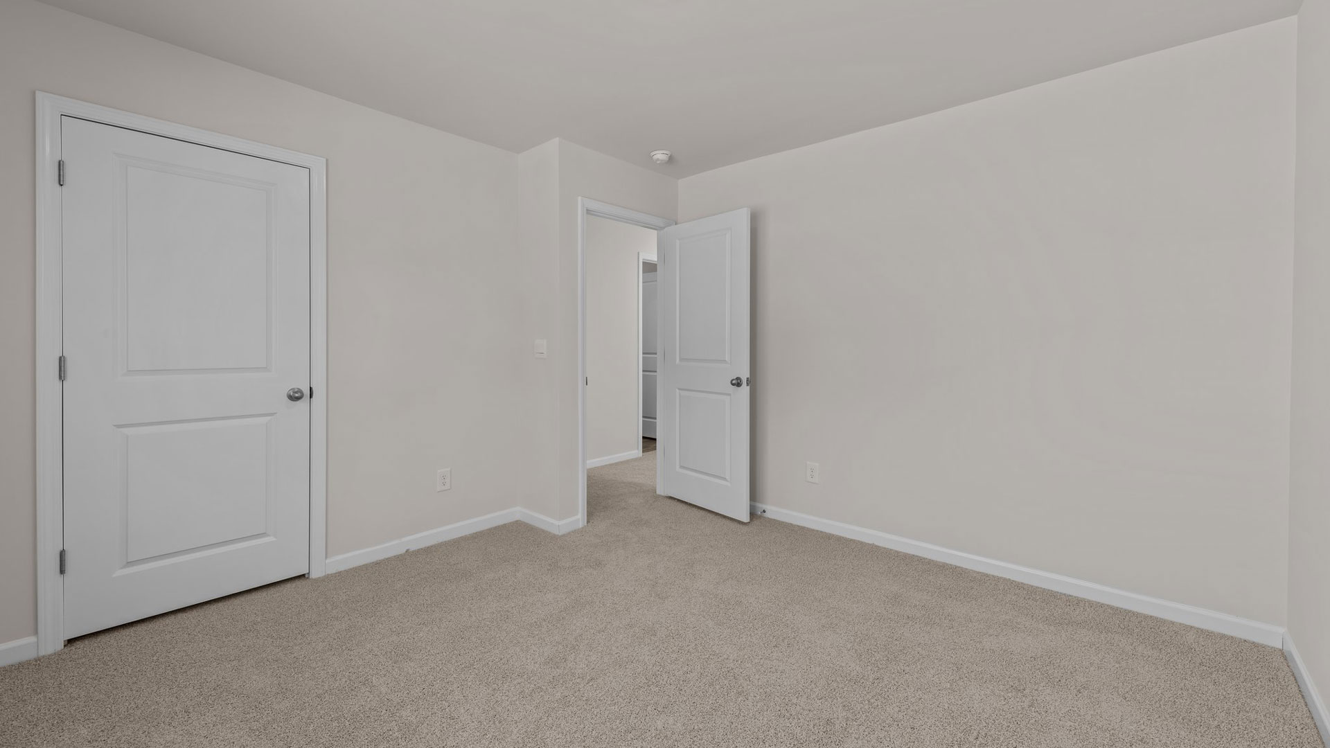 Bedroom with carpet flooring
