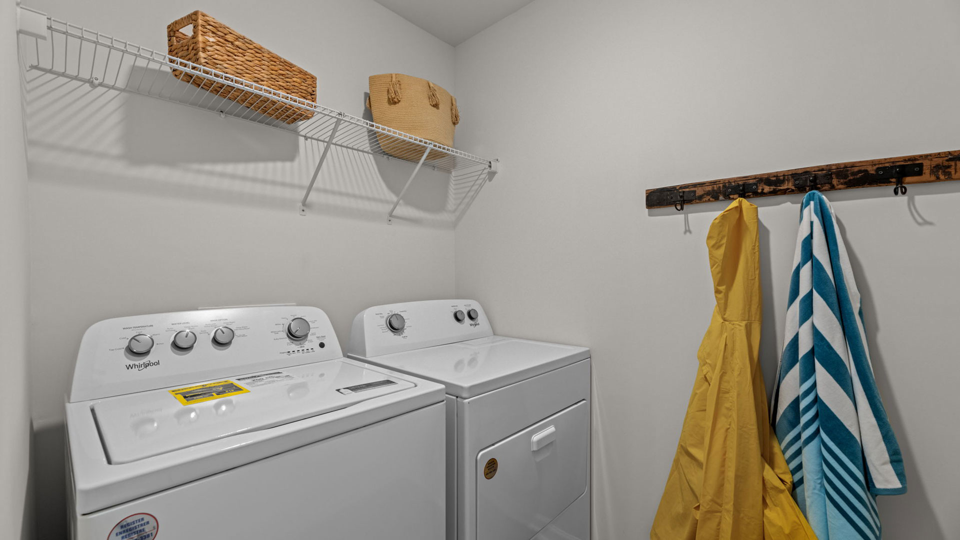 Laundry room with wired shelving