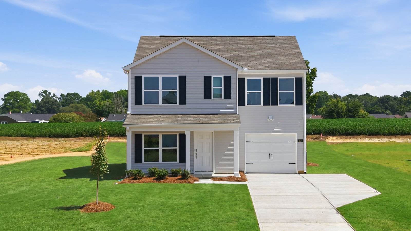exterior of two story home with garage