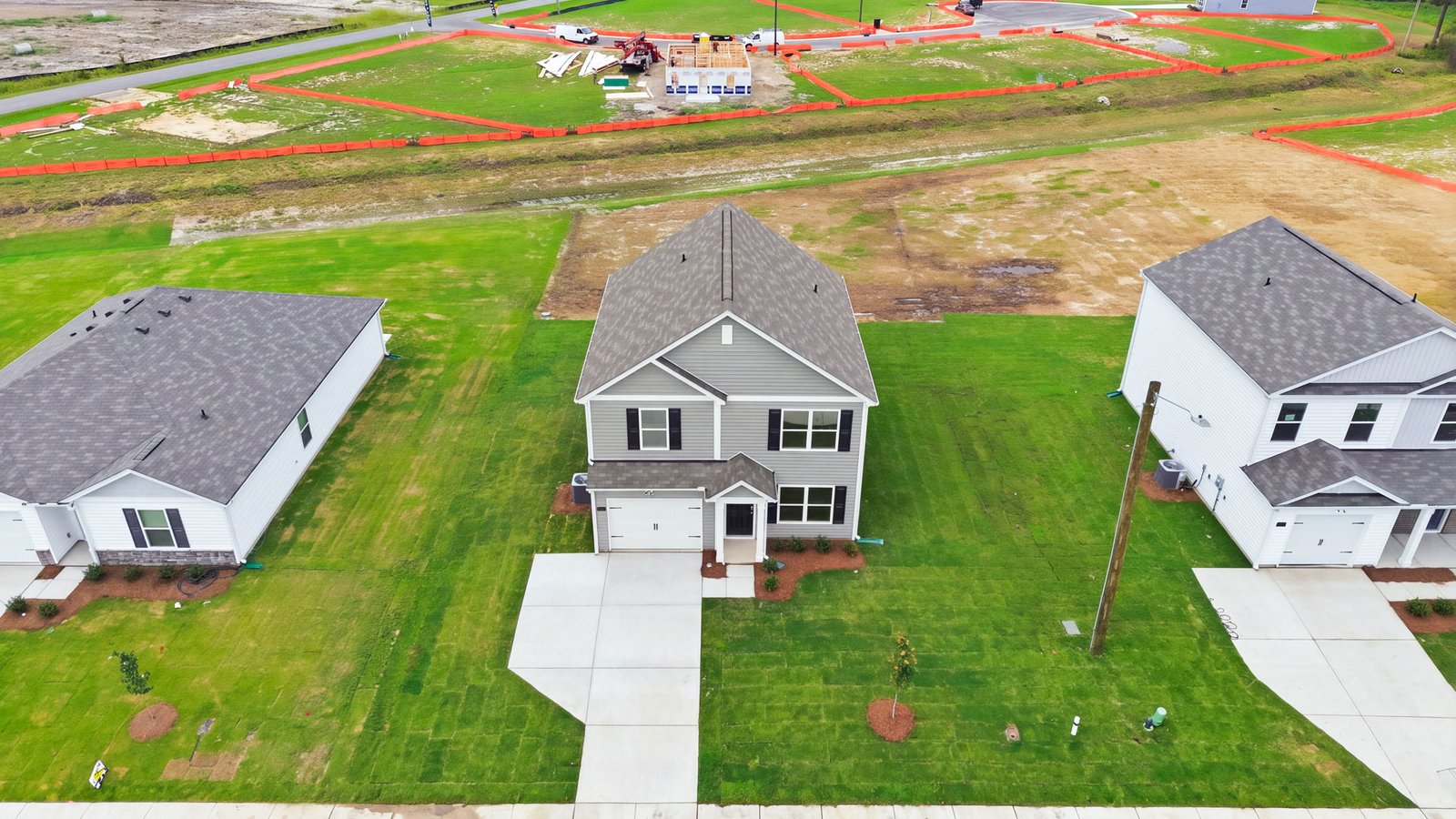 aerial view of home and lot