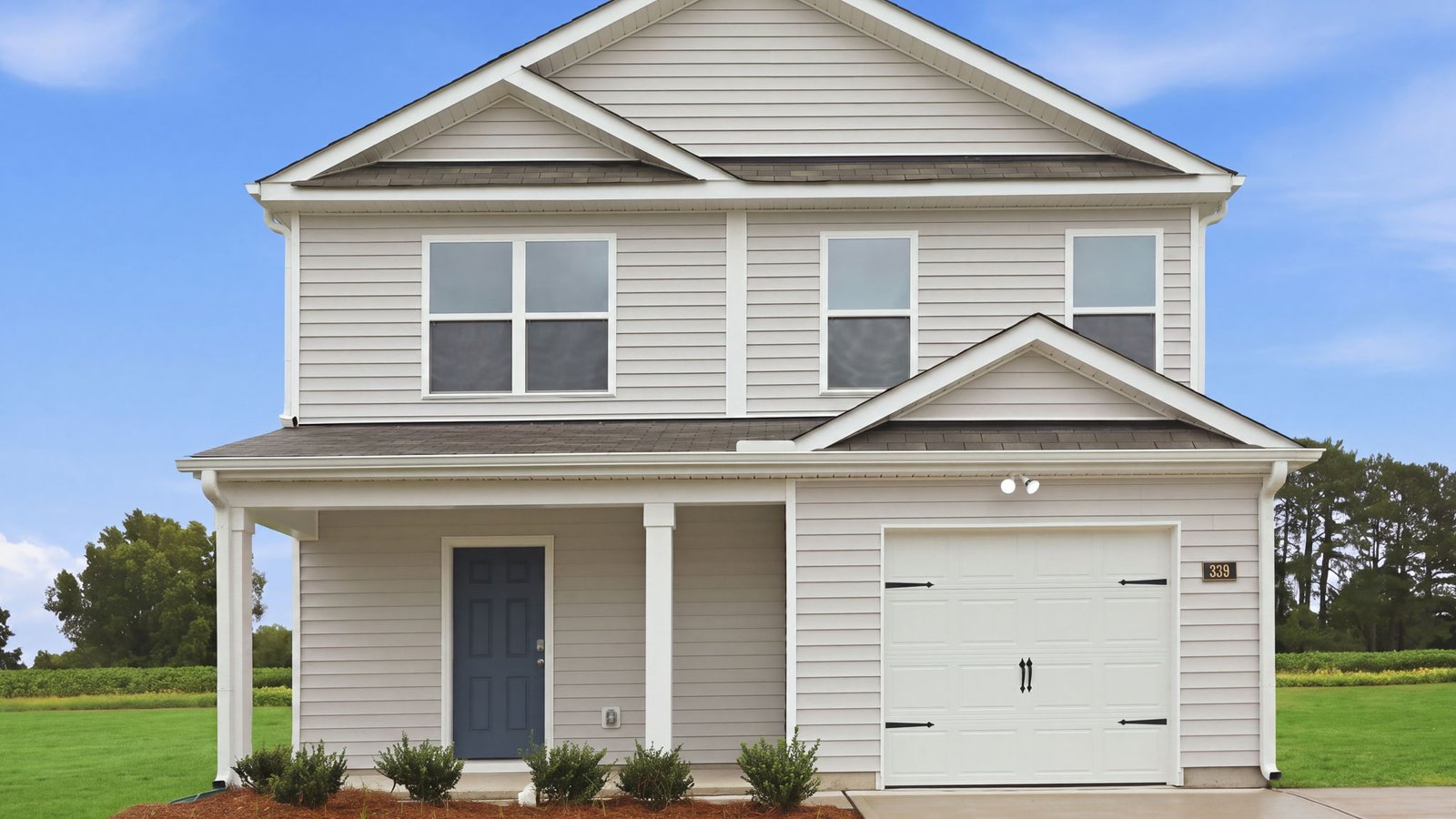 two story home with garage