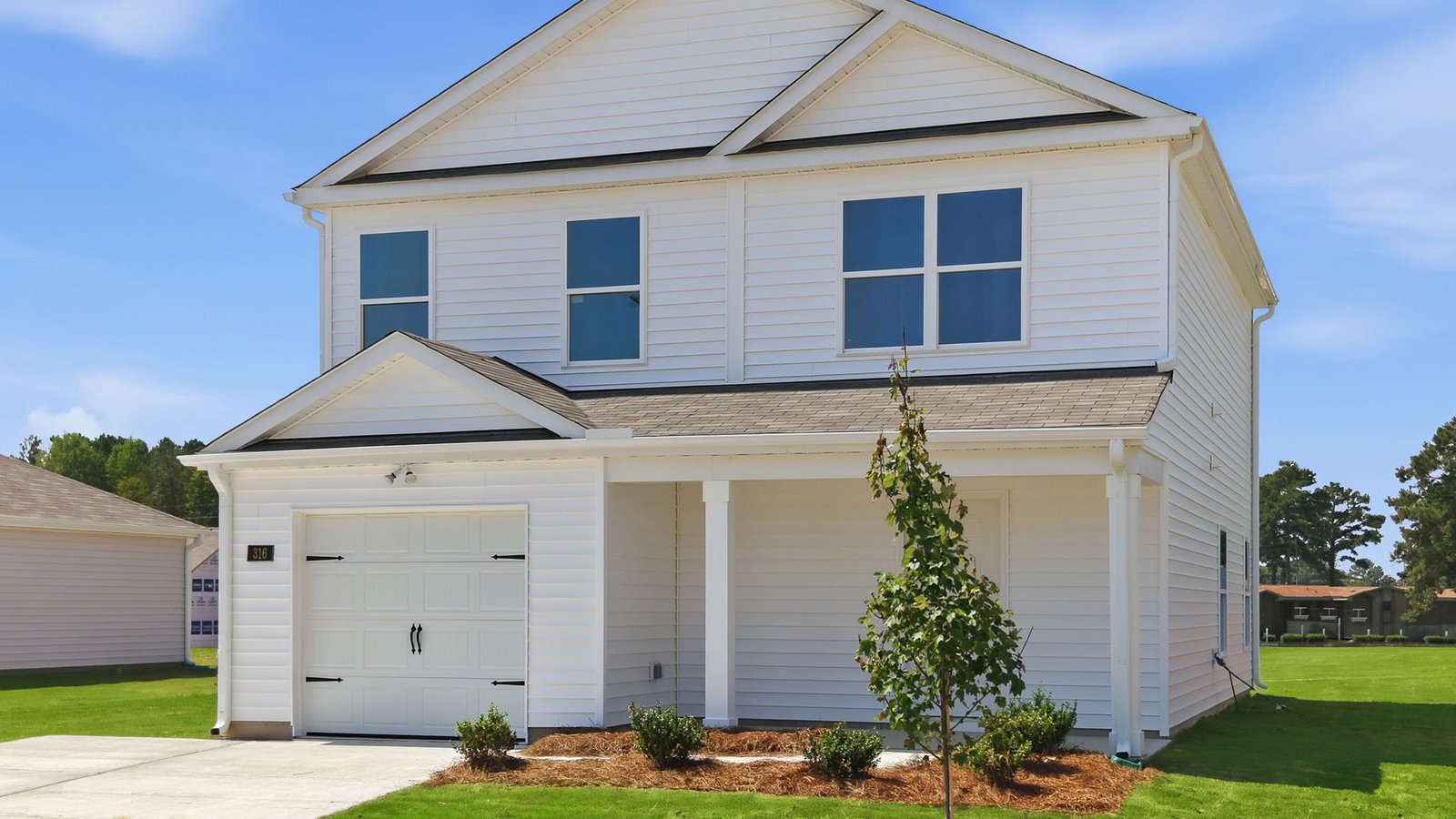 exterior of two story home with garage