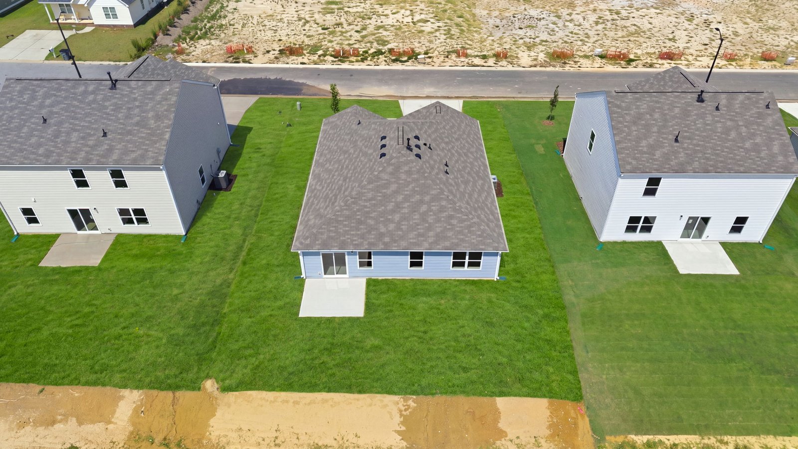 aerial view of home and lot