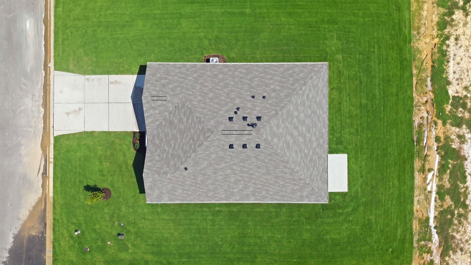 aerial view of home and lot