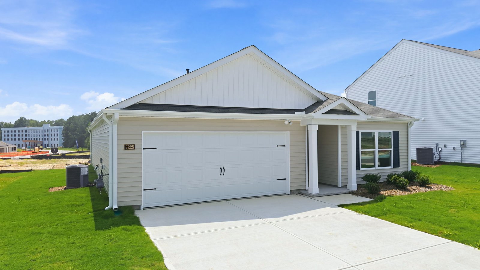 exterior photo of driveway and garage