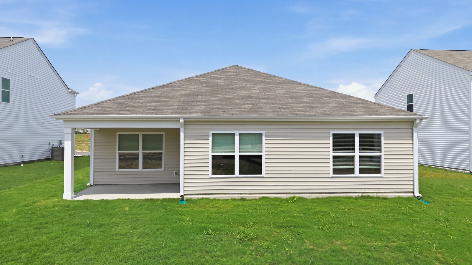 rear view of home and covered patio