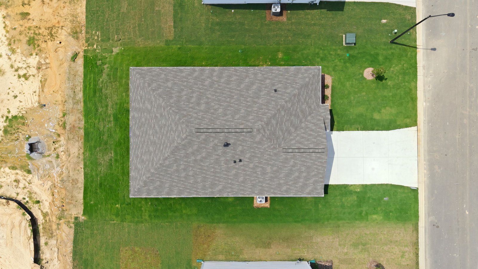 aerial view of home and lot