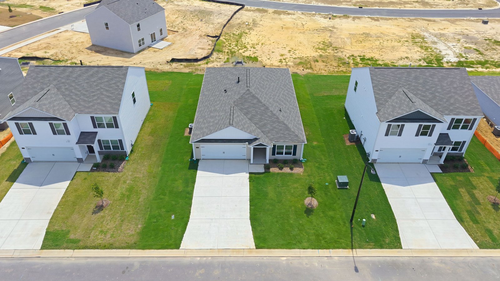 aerial view of home and lot
