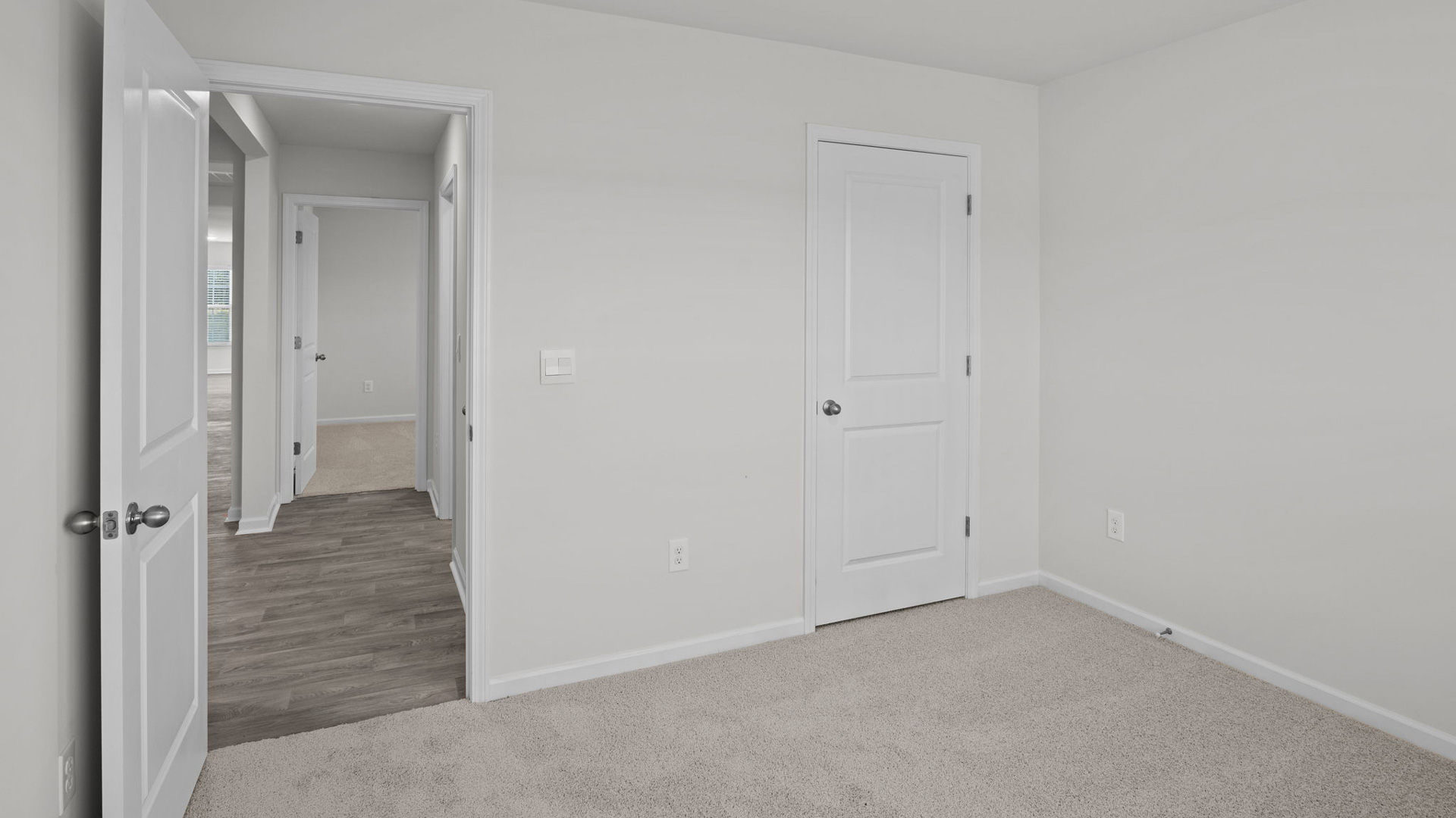 Bedroom with carpet flooring