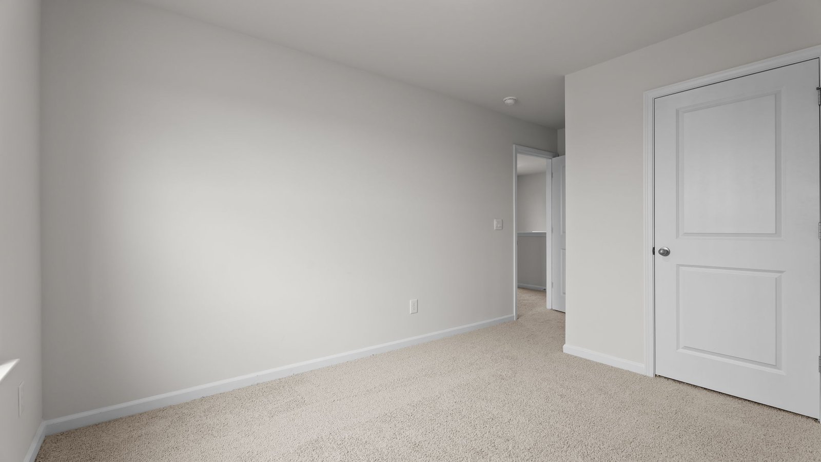 Bedroom with carpet flooring