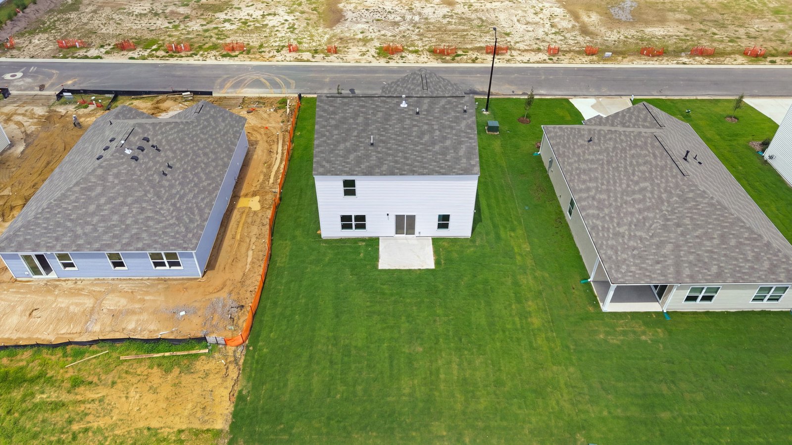 aerial view of yard and home