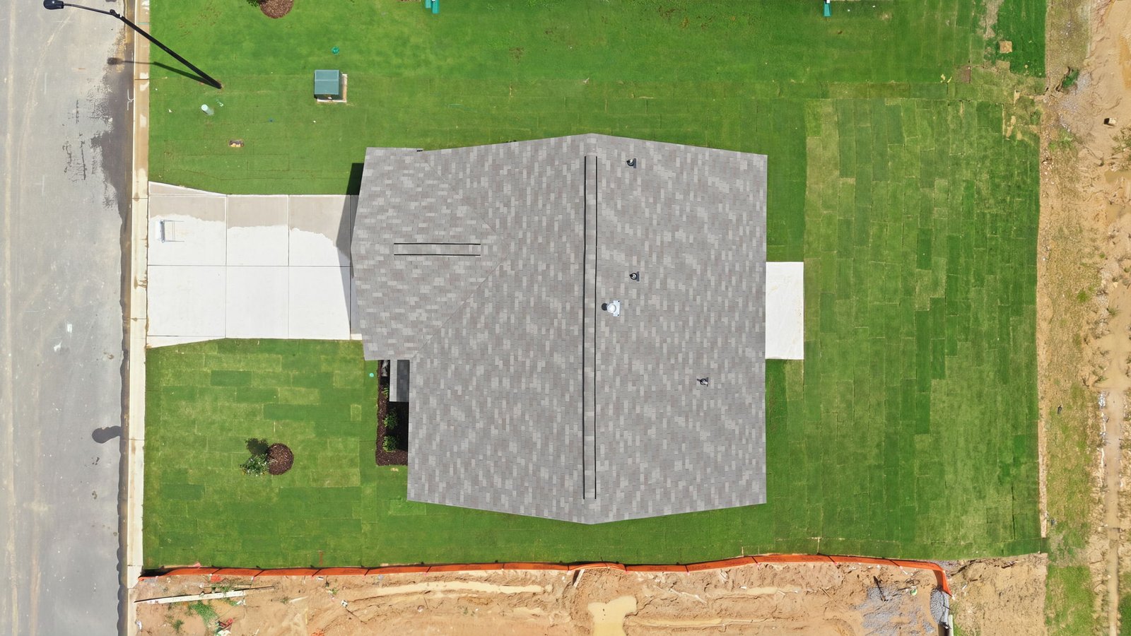 aerial view of two story home and yard