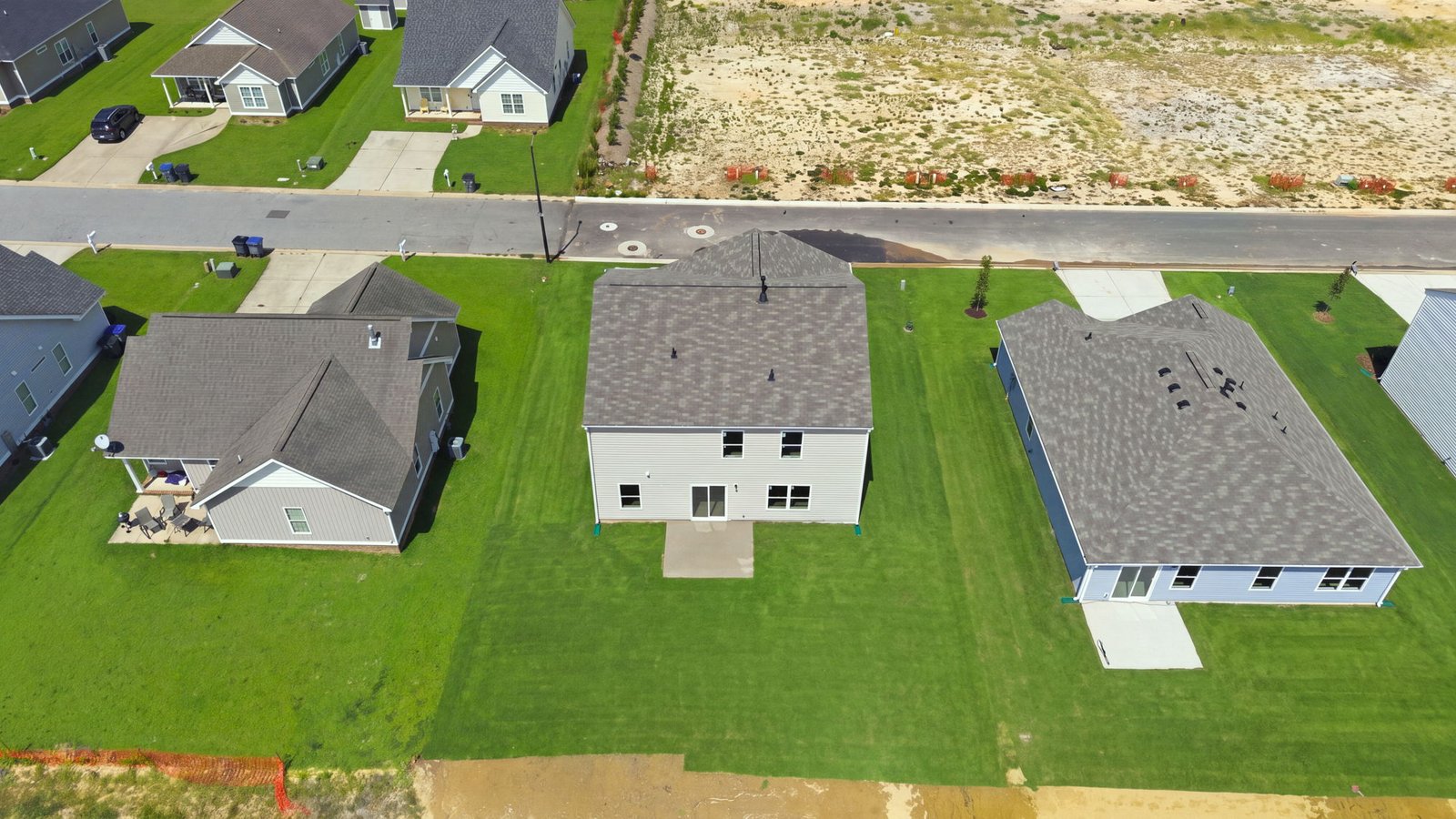 aerial view of home and lot