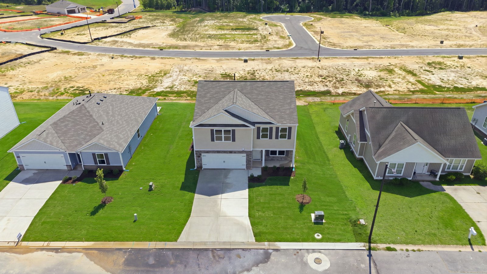 aerial view of home and lot