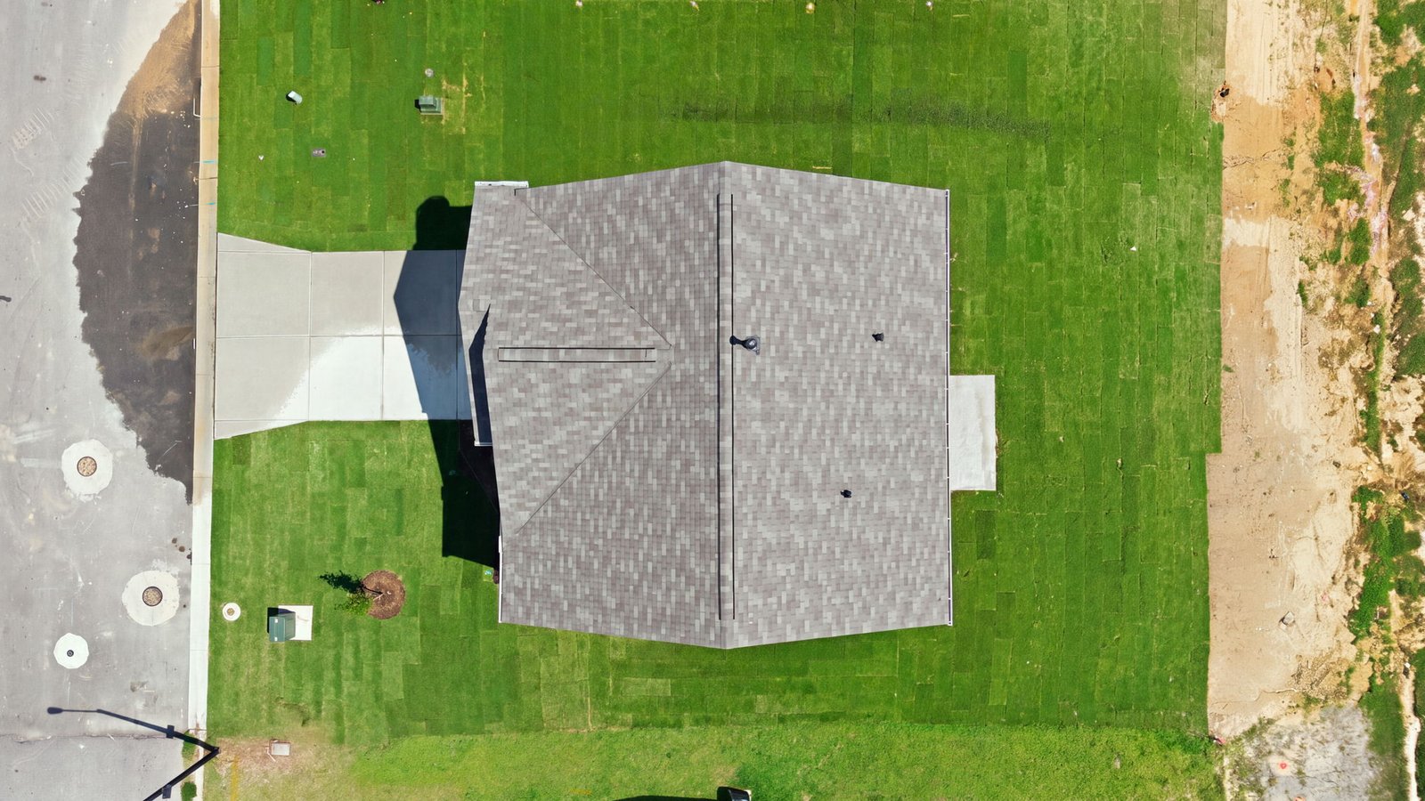 aerial view of home and lot