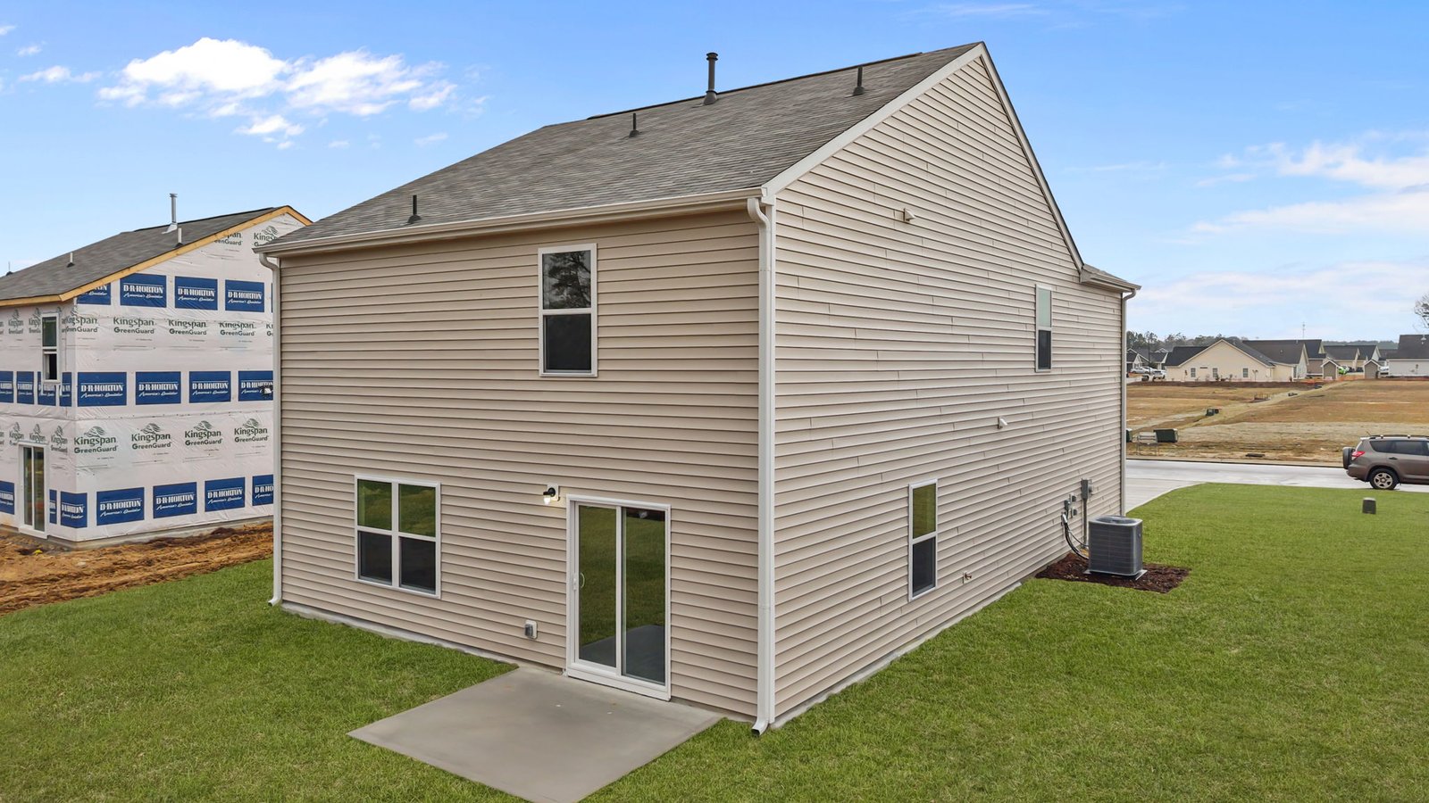 rear exterior of home with back patio