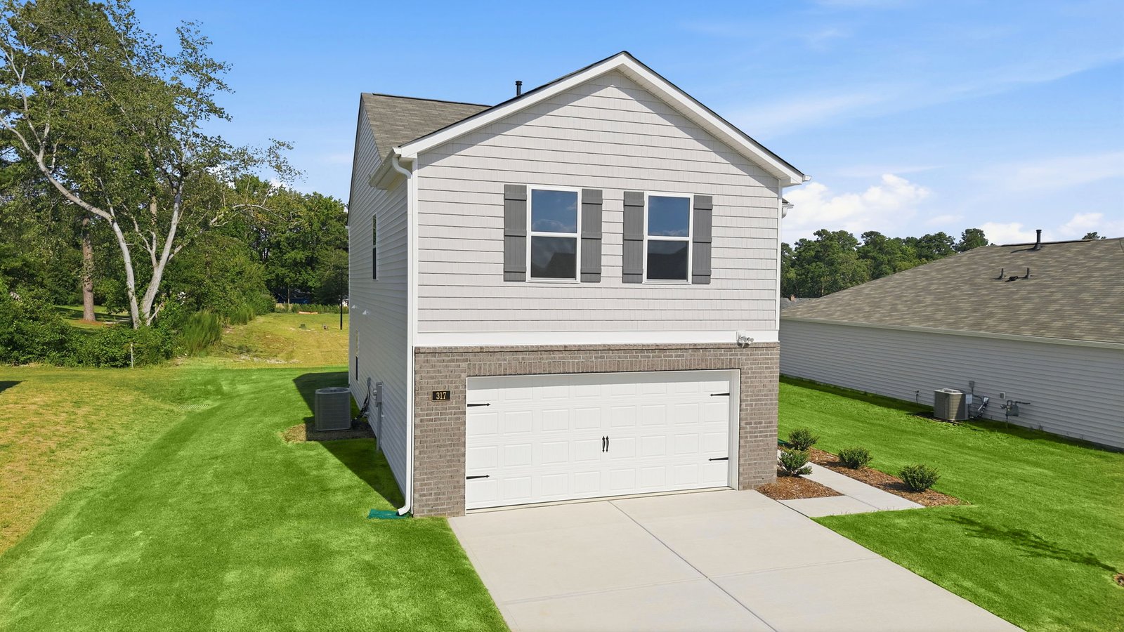 exterior of home and two car garage